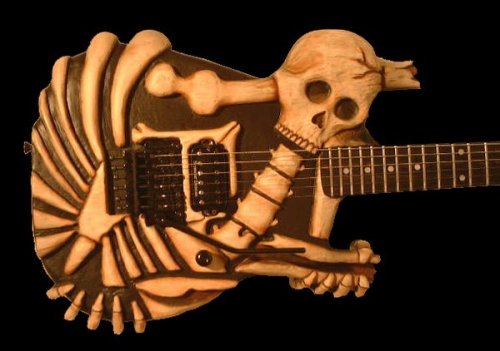 http://dreamworlds.ru/uploads/posts/2010-06/thumbs/1277027705_esp-skull-bones-guitar-black.jpg